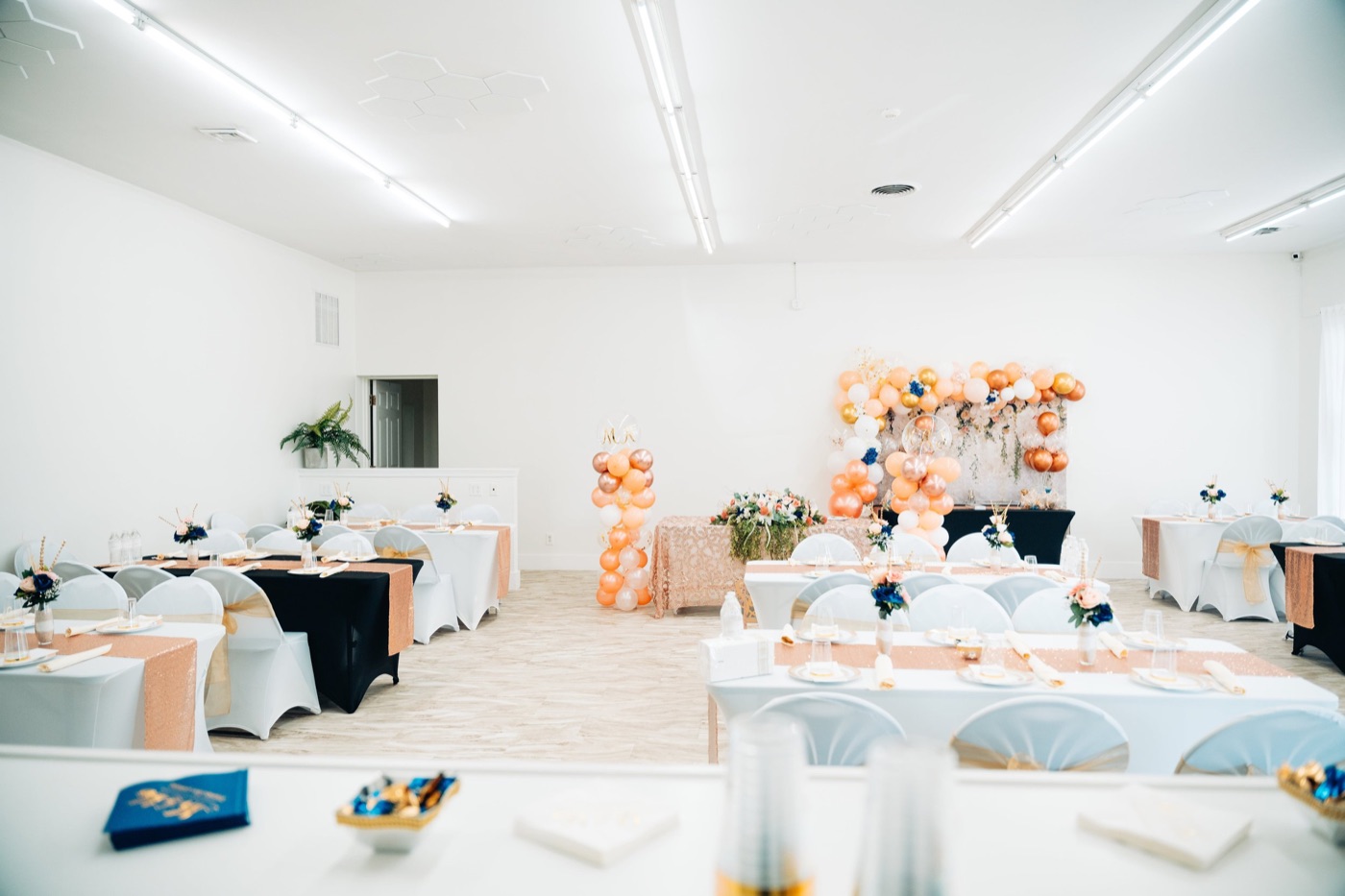 A real wedding reception set up inside Studio 87, the Dundalk, Maryland event venue behind this wedding venue marketing page
