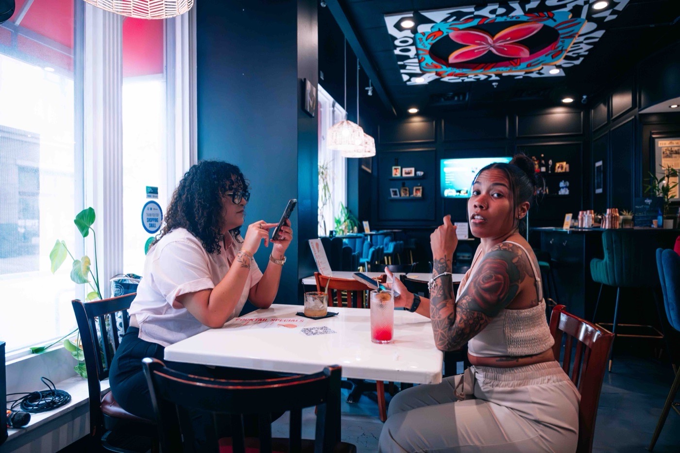 Guests at a Colado Latino Network event hosted inside The Empanada Lady, a Latino-owned business in downtown Baltimore, MD