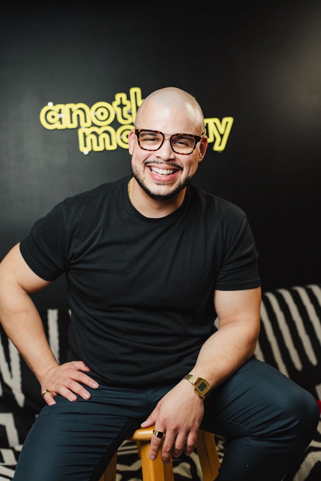 Willis Aybar in front of the Another Monday sign in Baltimore, the operator behind the search-first growth this section describes