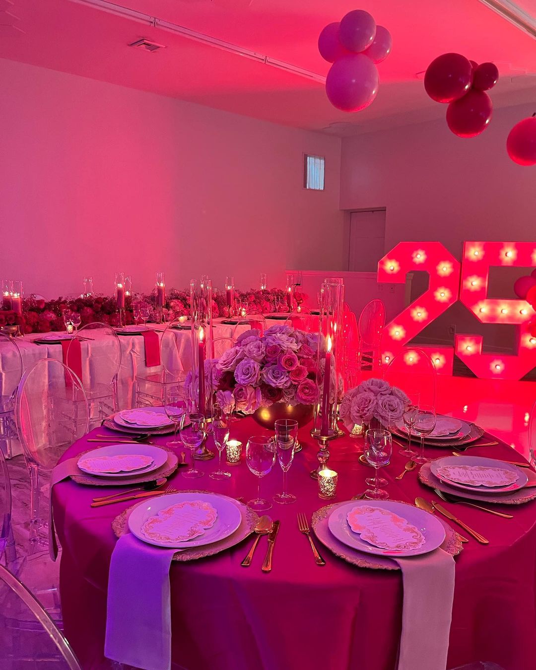 Round tables set and lit for a booked party at Studio 87, the Dundalk event venue whose event venue marketing Willis Aybar ran himself